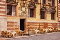 Restaurant tables in front of Palazzo Ragione in Piazza dei Signori in Verona