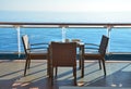 Restaurant tables on the open deck of cruise ship Royalty Free Stock Photo