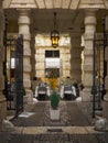 Restaurant tables under an ancient portico, Verona