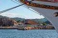 Restaurant Under visible behind the bow of tall ship Statsraad Lehmkuhl..