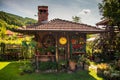 Restaurant in a vintage yard with wooden house, beautiful garden and much retro details