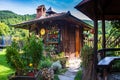 Restaurant in a vintage yard with wooden house, beautiful garden and much retro details