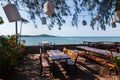 restaurant on the waterfront of rawai beach in thailand overlooking the sea and the island Royalty Free Stock Photo