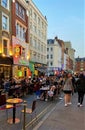 Restaurants and bars street seating in Old Compton Street Soho, London 2020