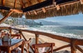 Restaurants and cafes with ocean views on Playa De Los Muertos beach and pier close to famous Puerto Vallarta Malecon, the city Royalty Free Stock Photo