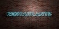 RESTAURANTS - fluorescent Neon tube Sign on brickwork - Front view - 3D rendered royalty free stock picture