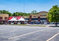 Restaurants in an Illinois strip mall open for business, patio dining and curbside pickup Royalty Free Stock Photo