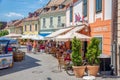 Restaurants and shopping people downtown medieval city Eger, Hungary