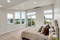 Restful bedroom interior with master bed placed under a sloped ceiling