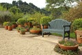 Resting bench in middle beautiful garden