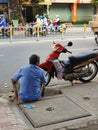 Resting on the corner motorcycle break, D4 HCMC, Vietnam Royalty Free Stock Photo