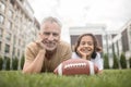 A dad and a son resting after the game Royalty Free Stock Photo