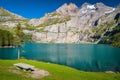 Resting place on the lake shore, Oeschinensee lake, Switzerland