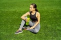 Resting time. Sporty girl drink water from a bottle. Royalty Free Stock Photo