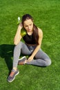 Resting time. Sporty girl drink water from a bottle. Royalty Free Stock Photo