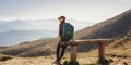 Female Hiker Resting on Top of the Mountain Royalty Free Stock Photo