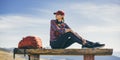 Female Hiker Resting on Top of the Mountain Royalty Free Stock Photo