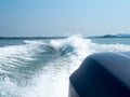 Restless Foamy Blue Sea Wake Water On The Sea Water Surface With Clear Blue Sky While Travel By Speed Boat In The Ocean