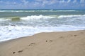 Restless sea on sandy beach Marina di Vecchiano nearby Pisa in Italy Royalty Free Stock Photo