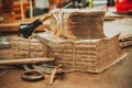 Restoration laboratory. Ancient books surrounded by tools and equipment