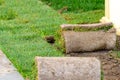 Restoration of a lawn covering with the help of a rolled lawn. Real grass in peat rolls. Quick way to improve the