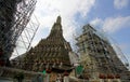 The restoration repairs a temple Wat Arun
