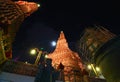 The restoration repairs a temple Wat Arun