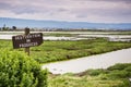 Restoration sign in the wetlands in Alviso Marsh, Don Edwards wildlife refuge, south San Francisco bay, California