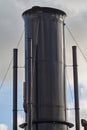 The Restored Black Steam Funnel and Brass Ships Whistle of the Dutch Navy Steam Frigate HNLMS Bonaire, at Den Helder Marine Museum