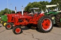 Restored C and M Farmall tractors