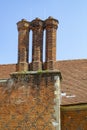 Restored chimney stacks on the roof of The Vyne a 500 year old Tudor mansion