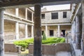 The restored courtyard of the few buildings still completely intact in the ash-burdened city of Pompeii, Italy