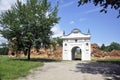 Restored entrance gate and remains of the walls of the Carthusian monastery of 1648-1666 in the town of Bereza, Belarus