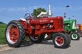 Restored Farmall Super H and Oliver 770 tractors