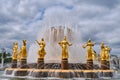 The restored Fountain Friendship of Peoples at VDNH, beautiful golden statues. Moscow, Russia 05 24 2019 Royalty Free Stock Photo