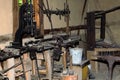 The restored interior of a medieval forge, smithy