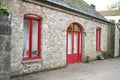 Restored coach house has pop of color