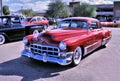 Restored Mid-Century Red Cadillac With Tail Fins