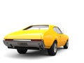 Restored old school bright yellow vintage muscle car - back view Royalty Free Stock Photo