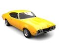 Restored old school bright yellow vintage muscle car - studio shot Royalty Free Stock Photo