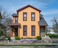 Restored Orange Duplex House with Purple Phlox