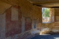 Restored painted Roman art walls and art floor mosaics and painted Roman art walls of the Theater House or Basilica House with