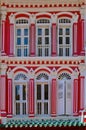 Red peranakan house with white windows