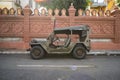 Restored retro jeep Willis during the American Vietnam war on the sand in the desert of Vietnam Royalty Free Stock Photo