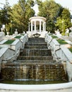 Restored rotunda and cascade ladder filled with water in the park pleases visitors. Fine architectural construction