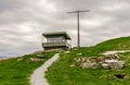 A restored world war II sentry watch point cabin on top of the hill at Fjoloy fort historical site