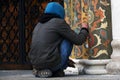 A restorer at work, Dormition church facade of Moscow Kremlin. UNESCO World Heritage Site.