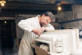 Restorer working with gypsum model Royalty Free Stock Photo