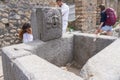 Restorers restoring one of the ancient fountains in Pompeii, Italy