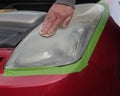 Restoring car headlights by applying a mild abrasive Royalty Free Stock Photo